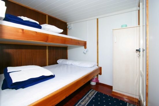 An example of a triple cabin on board a traditional ensuite vessel (Lopar)