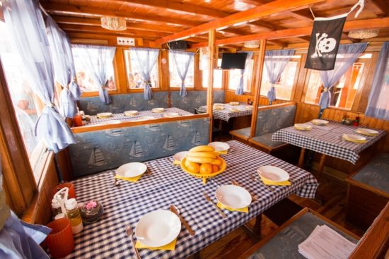 An example of the dining room on board a traditional ensuite vessel (Maja)