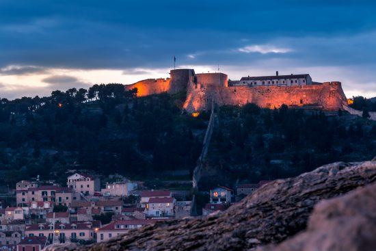 The Spanish fortress, that dates back to the 6th century, lights up the night in Hvar Town.