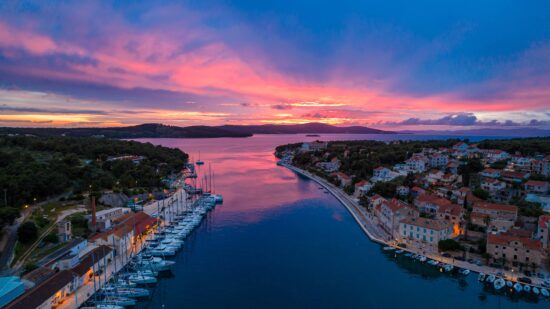 Milna port on the island of Brac at sunset.